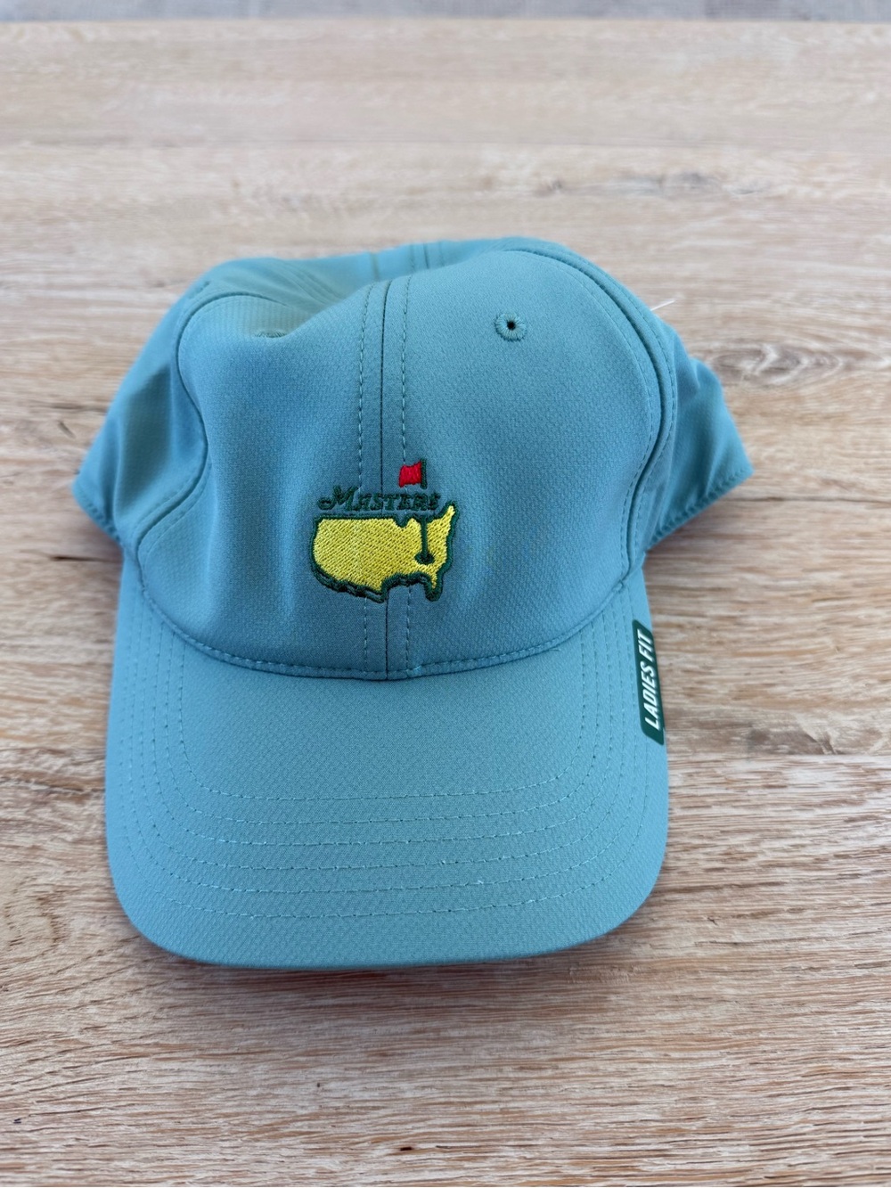 Masters 2026 Light Teal Ladies Golf Cap with Yellow Logo and Red Flag